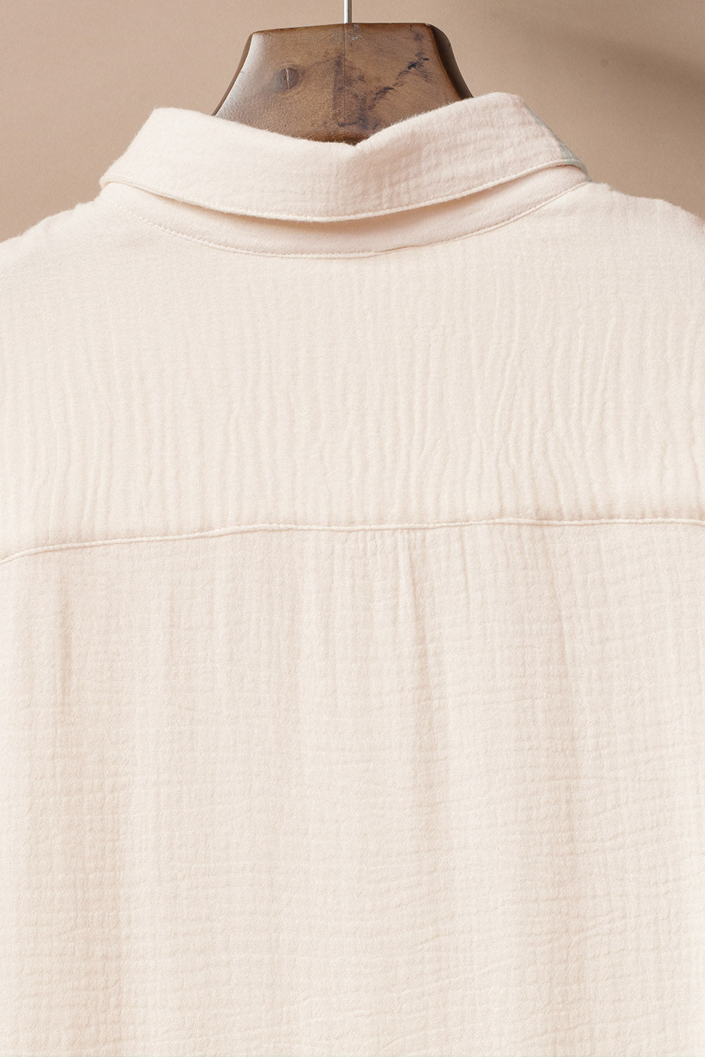 Beige cover-up by LuckeLadybug LLC, perfect for layering over a swimsuit and maxi dress.