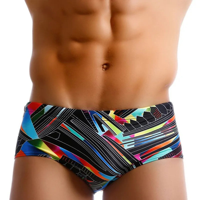 Colorful LuckeLadybug LLC Brazilian men's swimwear showcasing a modern abstract design for stylish beachwear