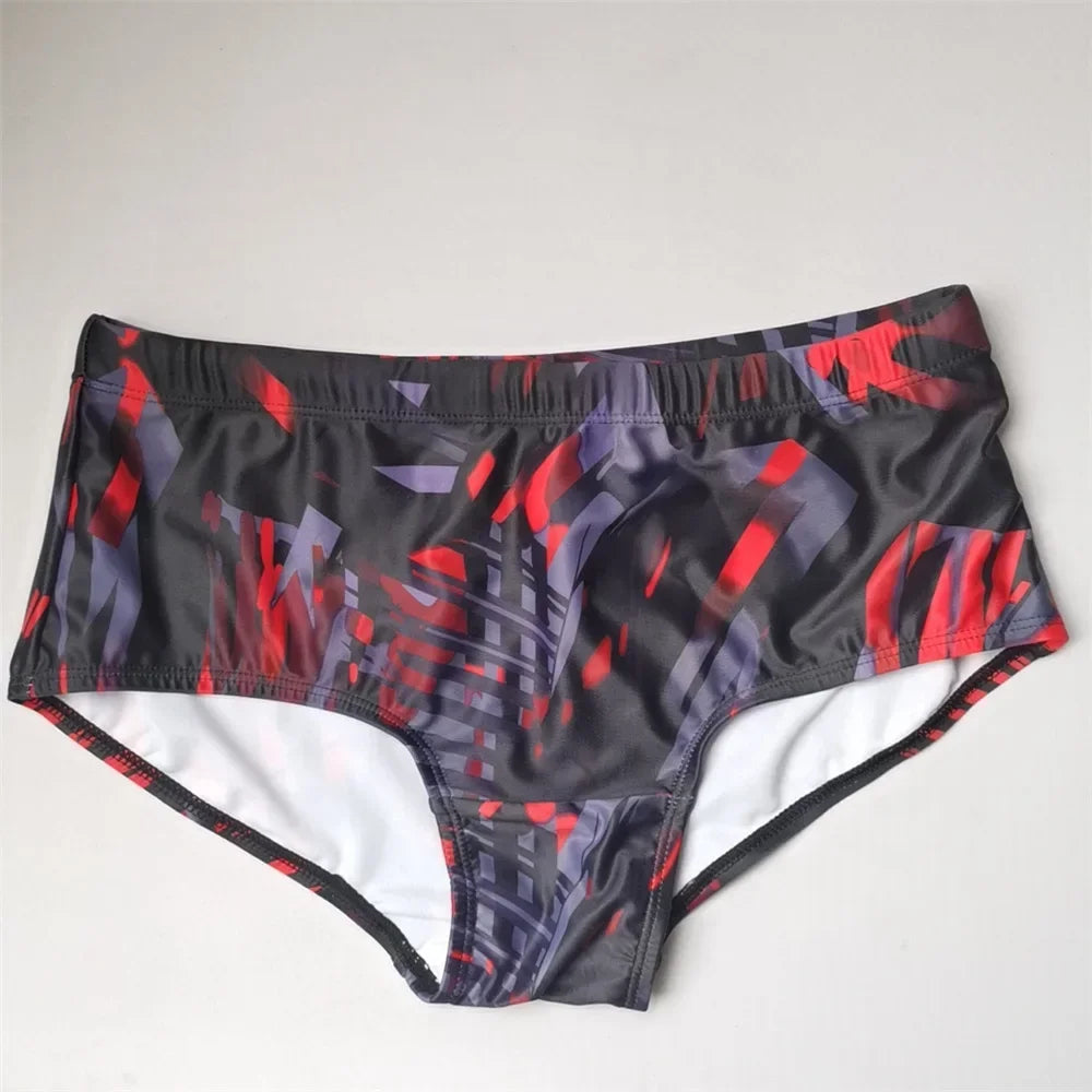LuckeLadybug Brazilian men's swimwear with a bold red and black geometric design for stylish beach days