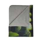 LuckeLadybug gnome forest sherpa blanket with soft gray sherpa lining and green forest design
