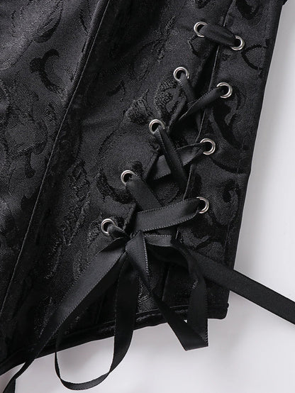 Close-up of black lace trim double halter corset featuring intricate lace-up detailing