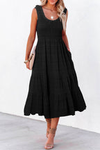 Black midi dress by LuckeLadybug LLC featuring a fit and flare design with pockets