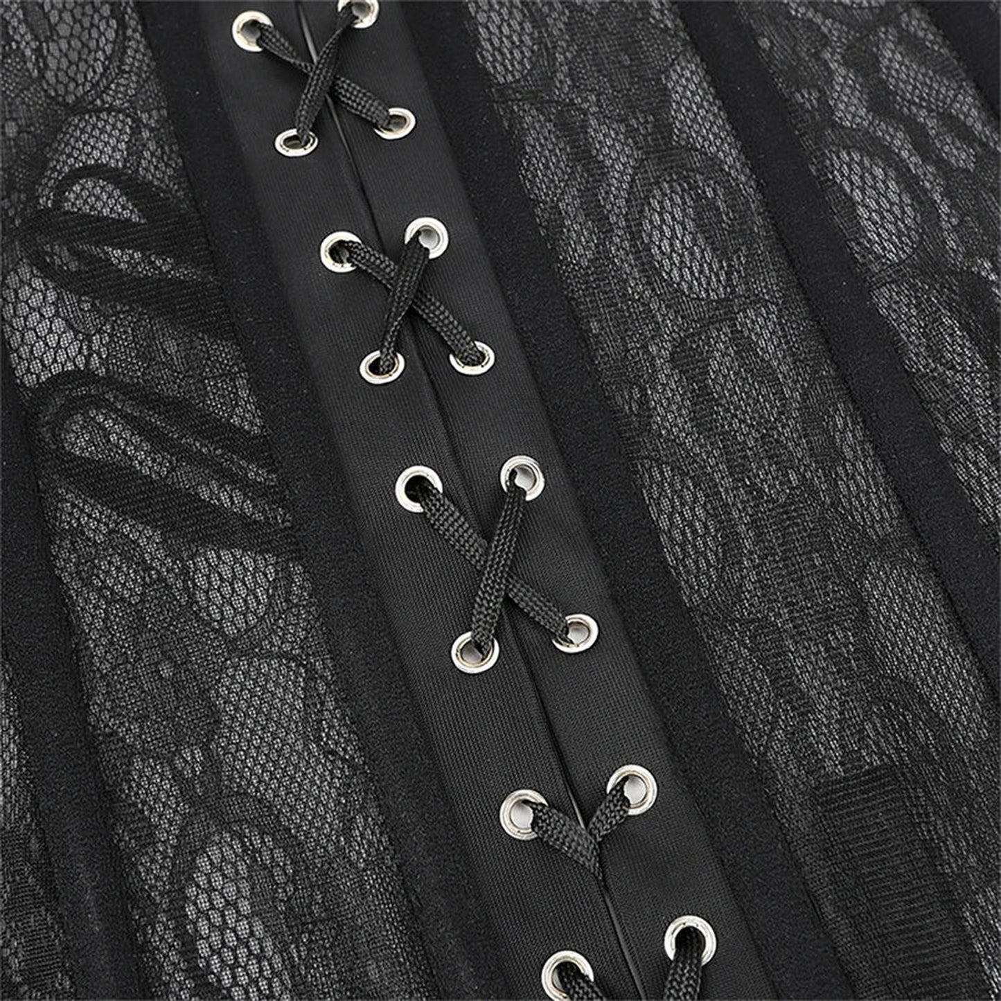 Close-up of plus size black lace corset featuring lace overlay and detailed lacing design