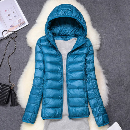 Teal plus size women puffer jacket with a hood for stylish warmth and comfort