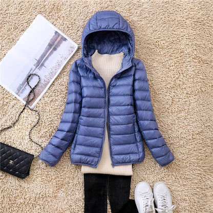 Blue plus size women puffer jacket with hood, perfect for casual winter outings and layering