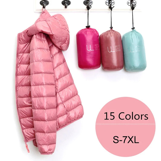 Pink plus size women puffer jacket hanging with storage bags in 15 colors and sizes S to 7XL