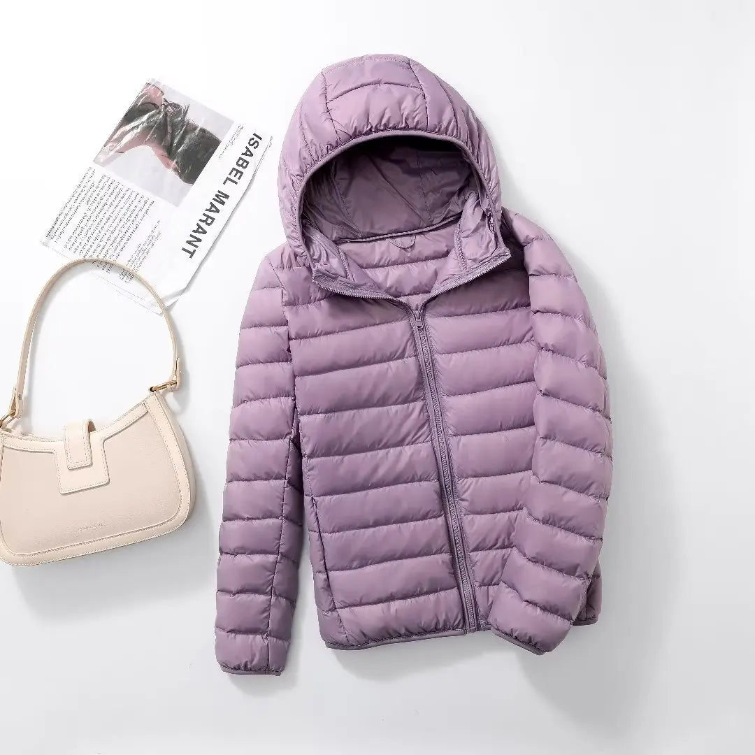 Light purple plus size women puffer jacket with a hood, perfect for stylish winter warmth