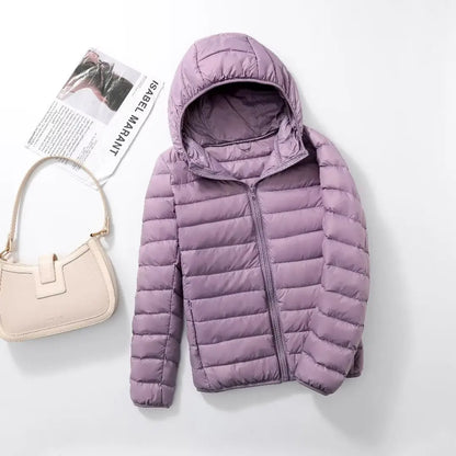 Light purple plus size women puffer jacket with a hood, perfect for stylish winter warmth