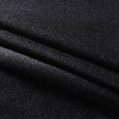 Smooth black fabric texture ideal for creating a red off shoulder corset top
