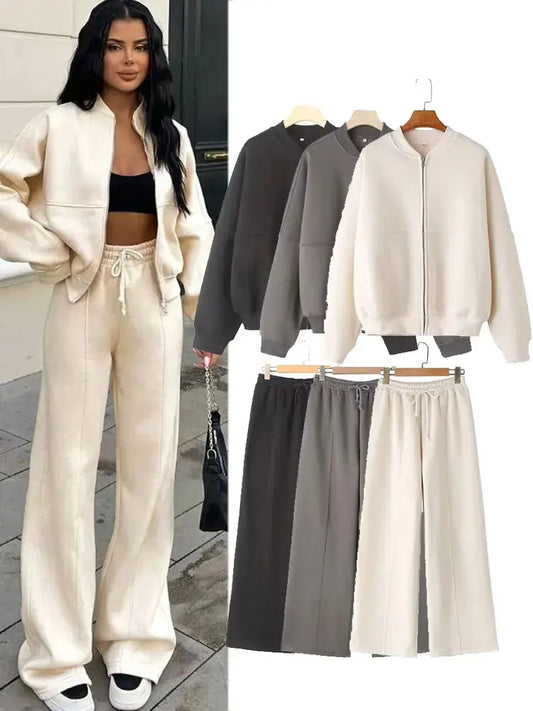 Trendy women's 2 piece fall outfit featuring a zip-up jacket and wide-leg pants in neutral tones