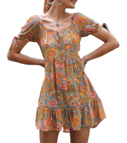 LuckeLadybug LLC vintage floral puff sleeve mini dress with a playful floral pattern and ruffled hem