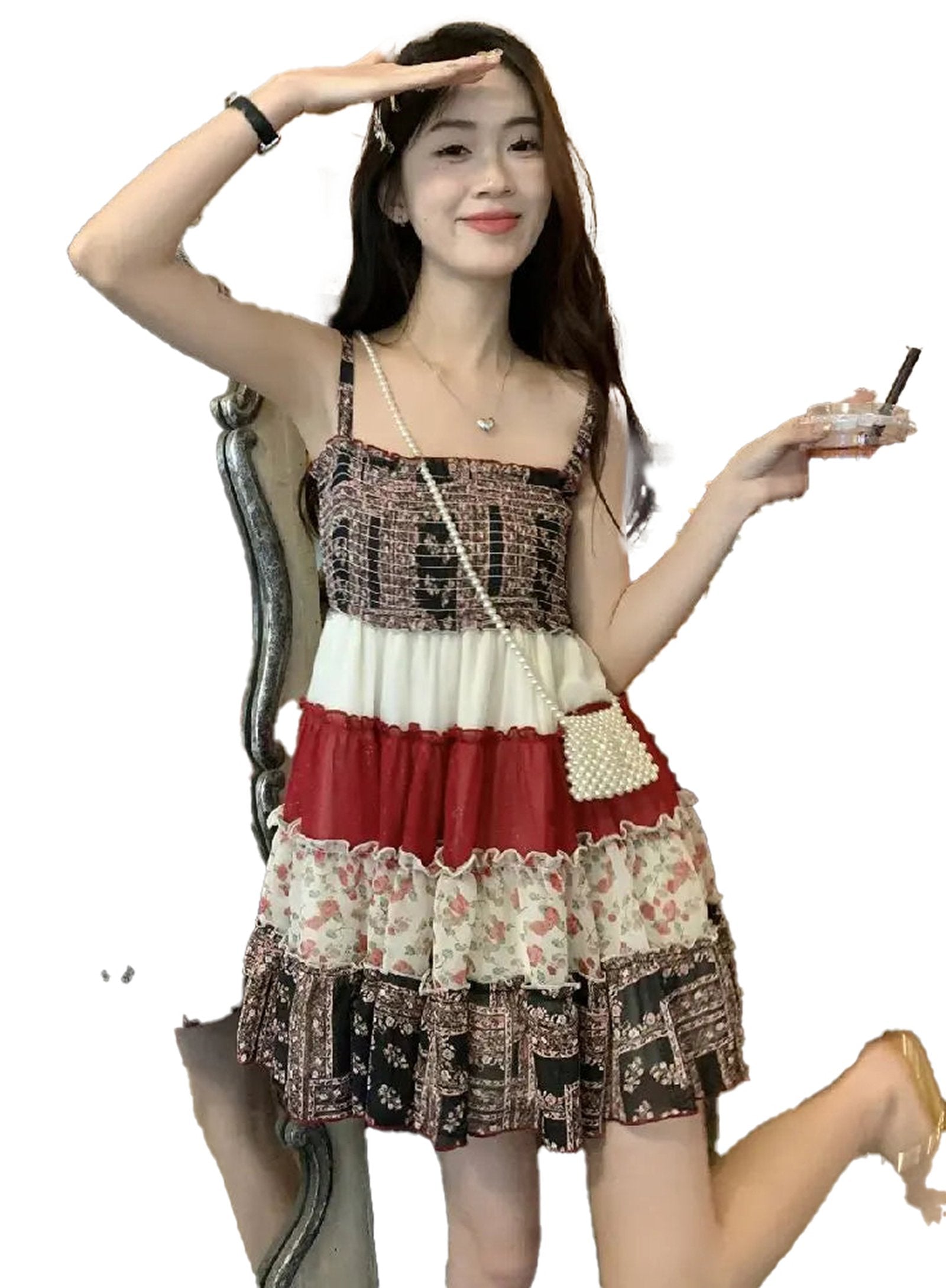 Young woman modeling a vintage patchwork mini sundress with a playful design and ruffled hem
