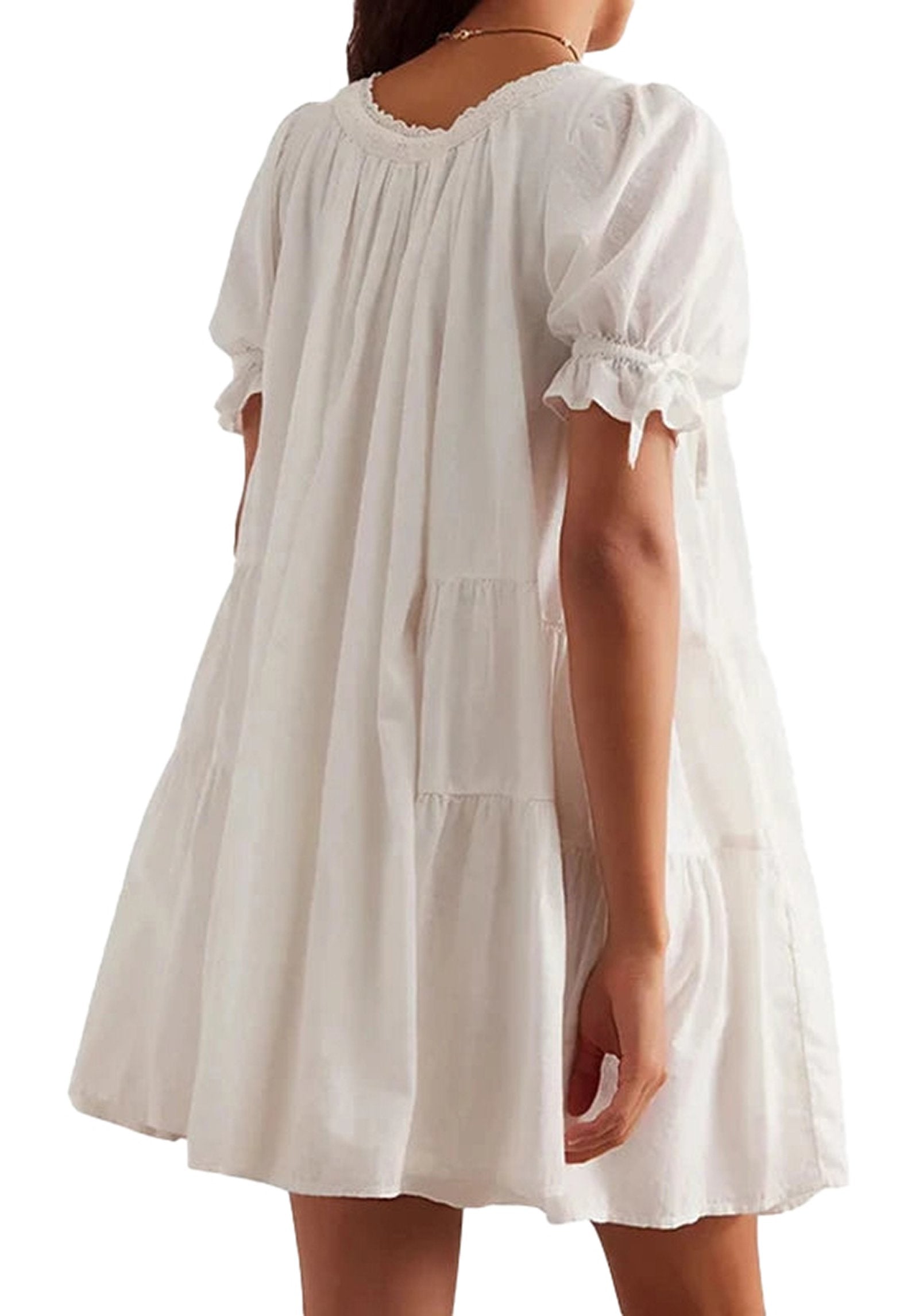LuckeLadybug vintage puff sleeve babydoll dress in white with a flowing design and gathered details