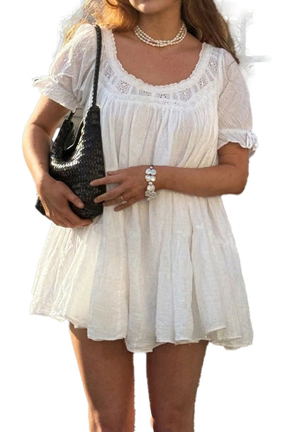 LuckeLadybug LLC Vintage Puff Sleeve Babydoll Dress in White with Lace Detailing and Flowy Fit