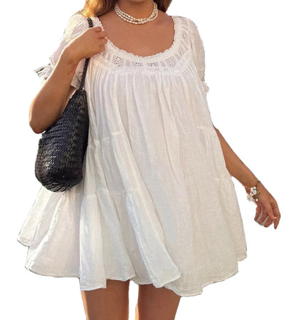 LuckeLadybug LLC Vintage Puff Sleeve Babydoll Dress in White with a Flowy Design and Lace Details