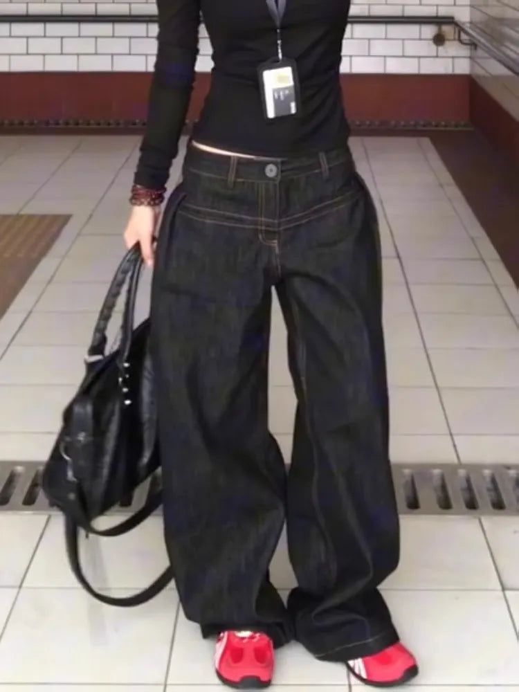 LuckeLadybug LLC vintage washed wide leg jeans women styled with a black top and red sneakers