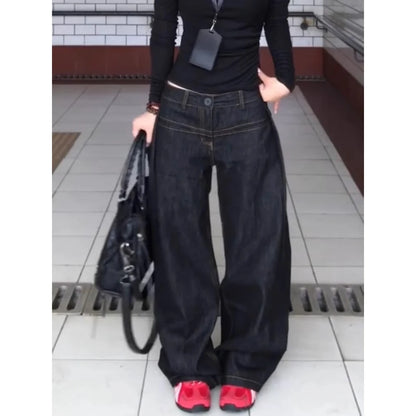 LuckeLadybug LLC vintage washed wide leg jeans women paired with a black top and stylish sneakers