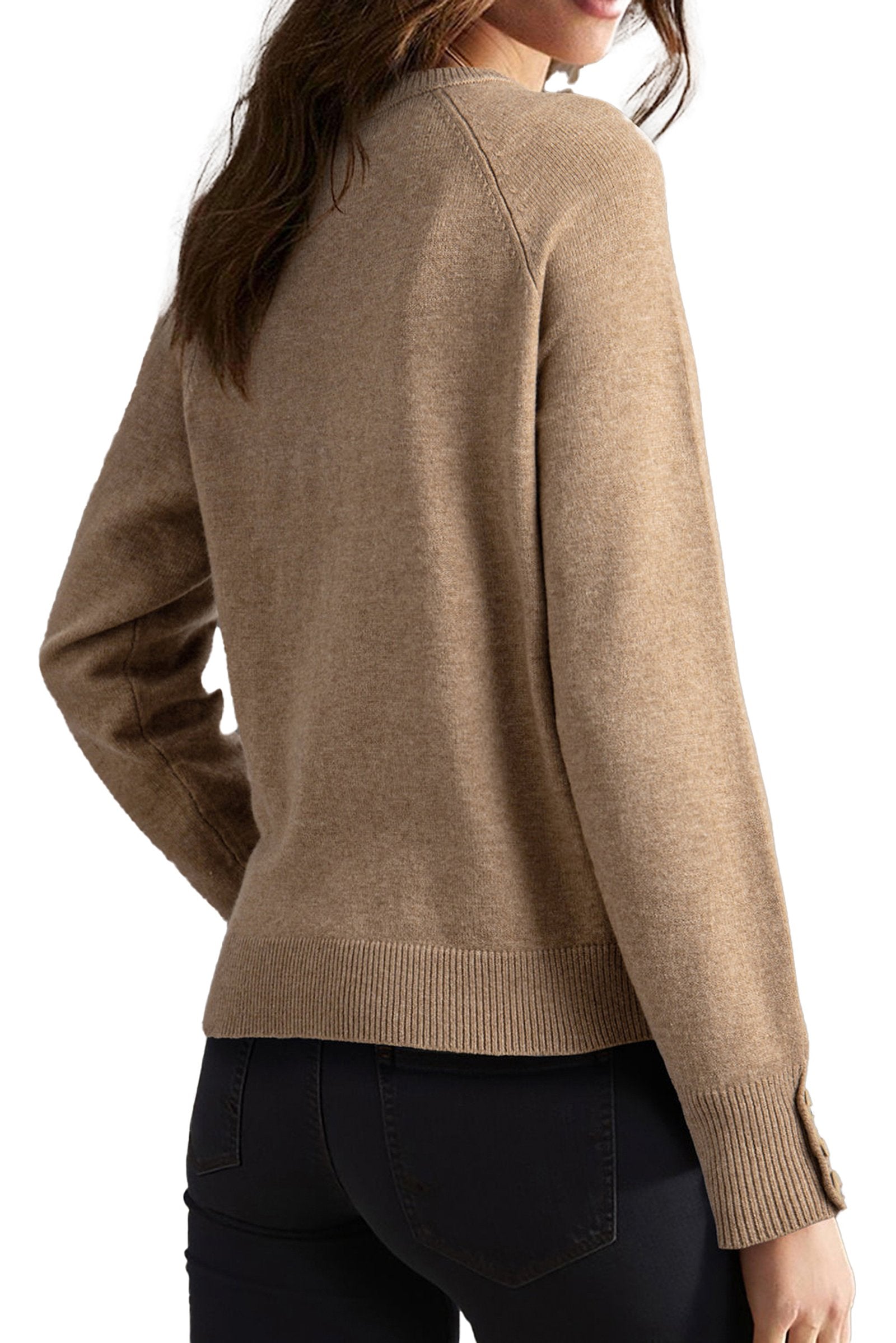 LuckeLadybug white bishop sleeve sweater featuring a soft design and button details on the sleeves