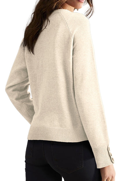 Back view of white bishop sleeve sweater from LuckeLadybug with stylish buttons on the sleeves