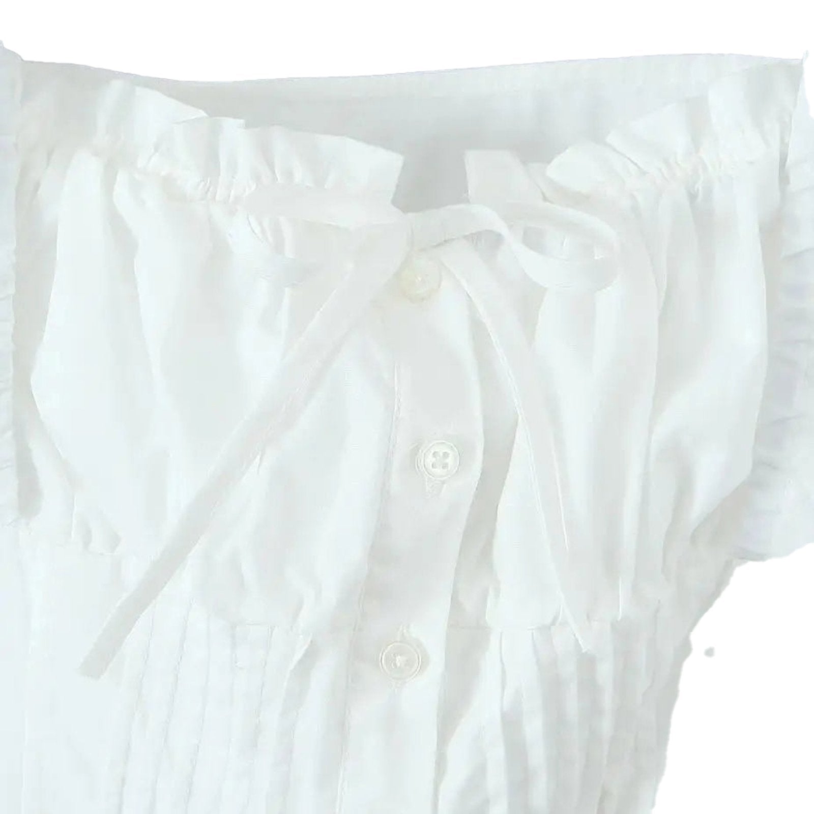 White corset crop top from LuckeLadybug LLC with ruffled sleeves and tie front detail