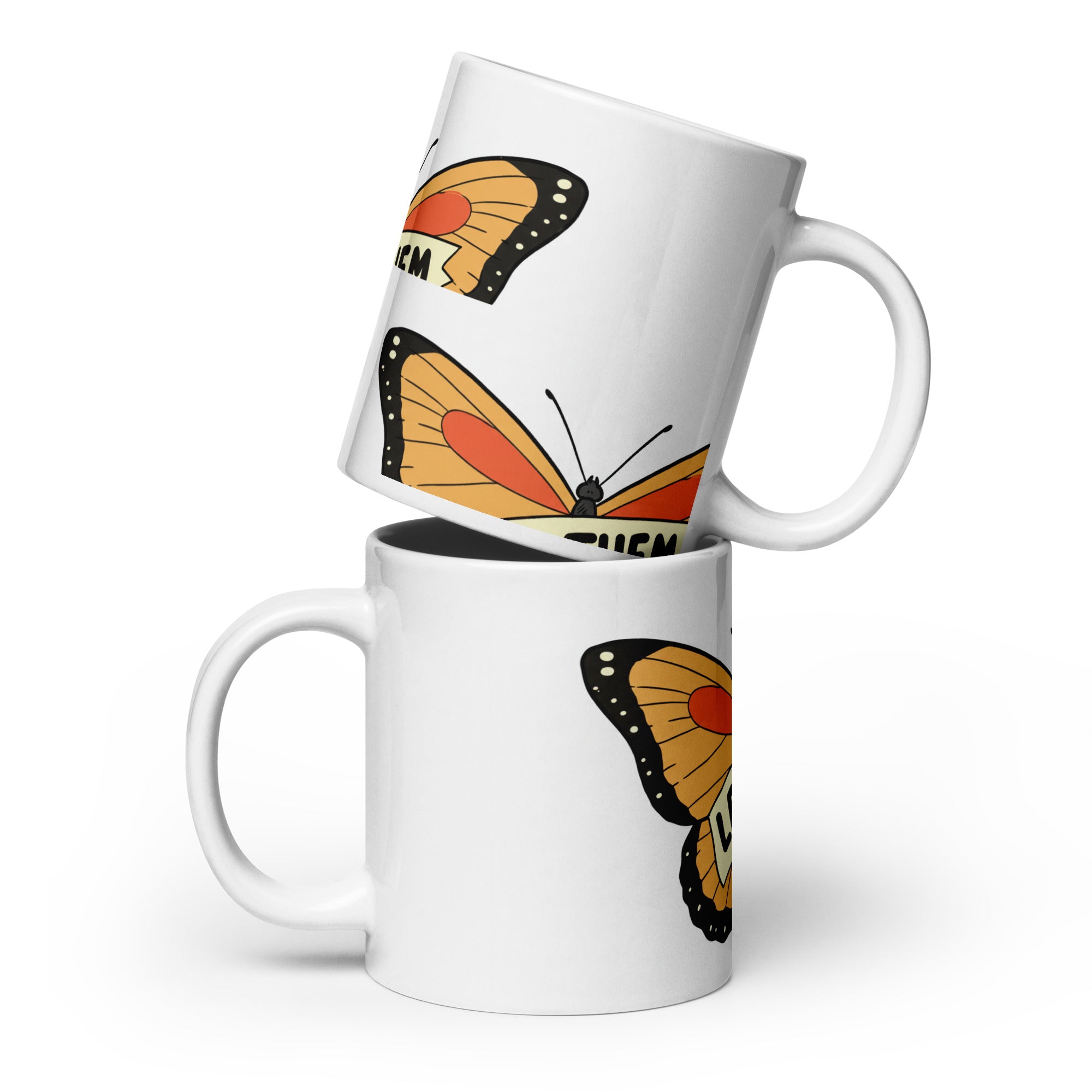 White glossy mug with butterfly design featuring orange and black butterfly wings by LuckeLadybug