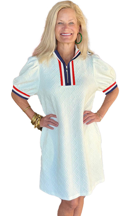 Stylish white jacquard mini dress with puff sleeves and colorful trim for a chic summer look