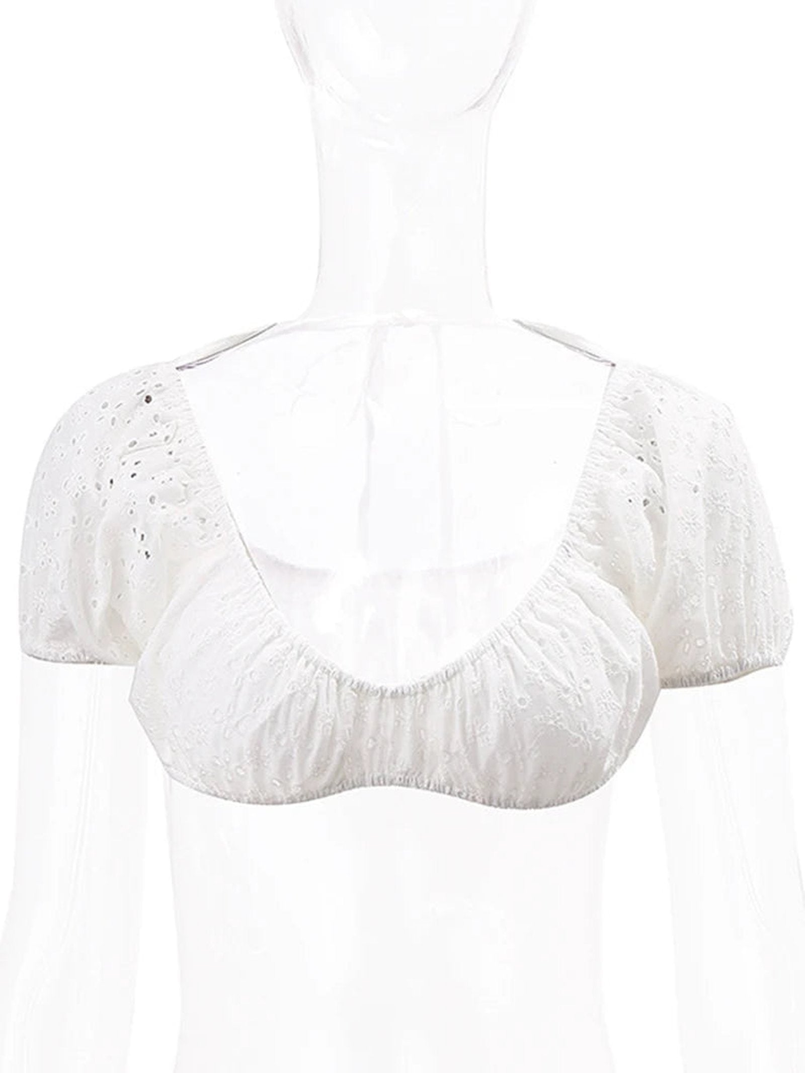 Stylish white puff sleeve crop top with delicate eyelet detailing for a trendy summer look