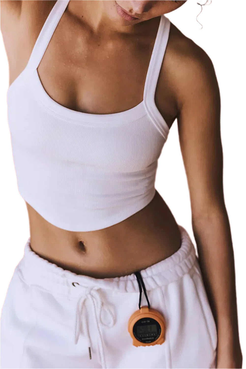 LuckeLadybug white ribbed cropped cami top worn by woman paired with white sweatpants