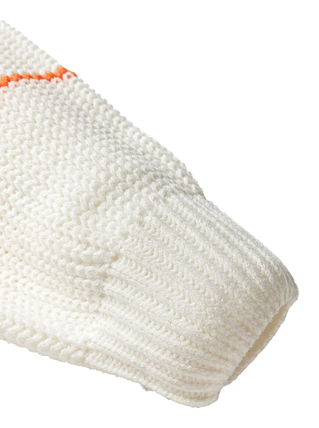 Close-up of a white v neck striped sweater featuring textured knit and vibrant stripes