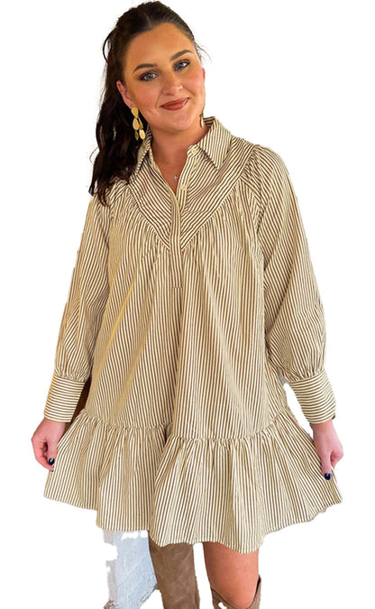 LuckeLadybug model wearing a brown striped mini dress with long sleeves ruffle hem and relaxed fit