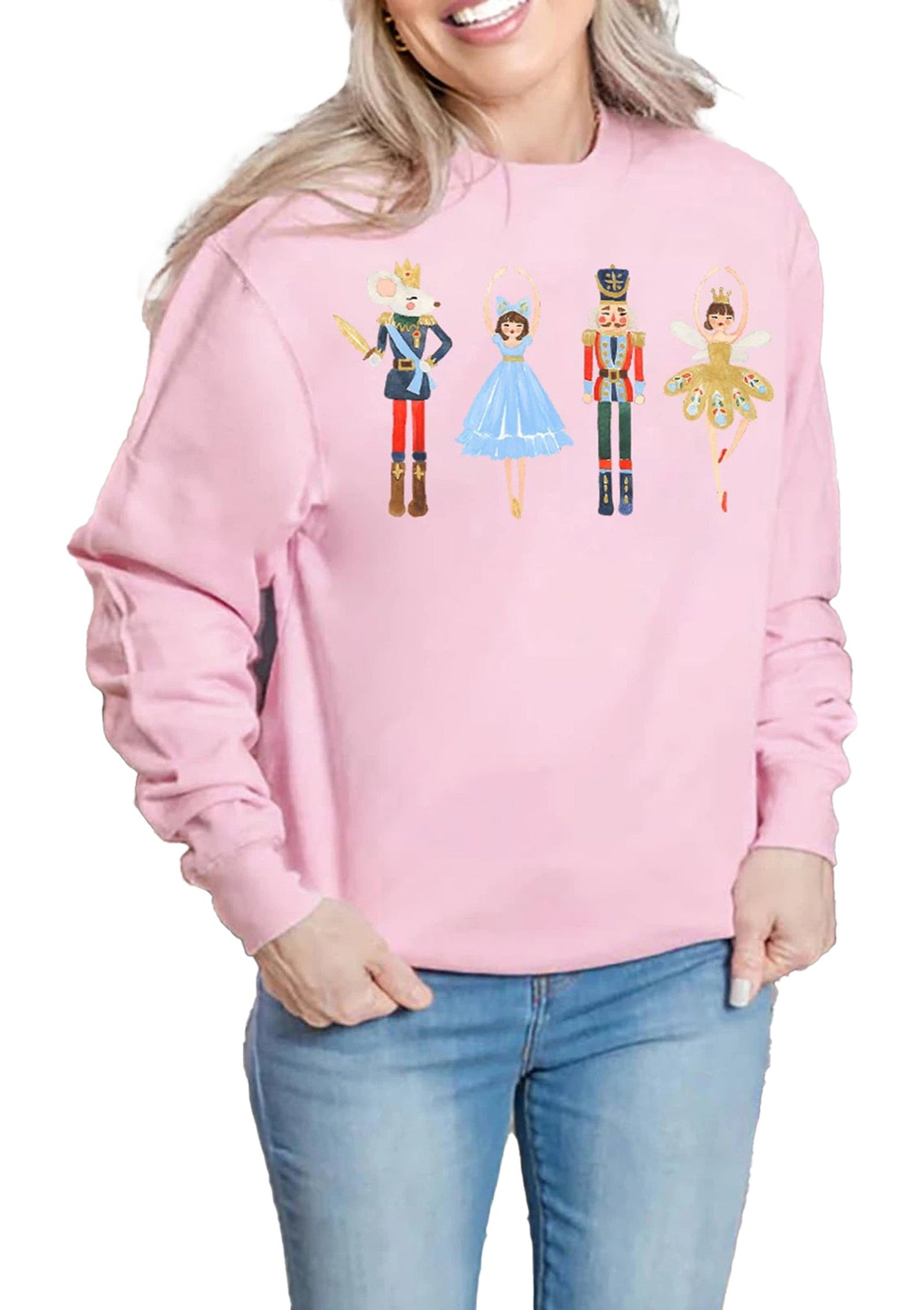 Pink women's Christmas pullover sweatshirt featuring festive nutcracker designs for holiday cheer