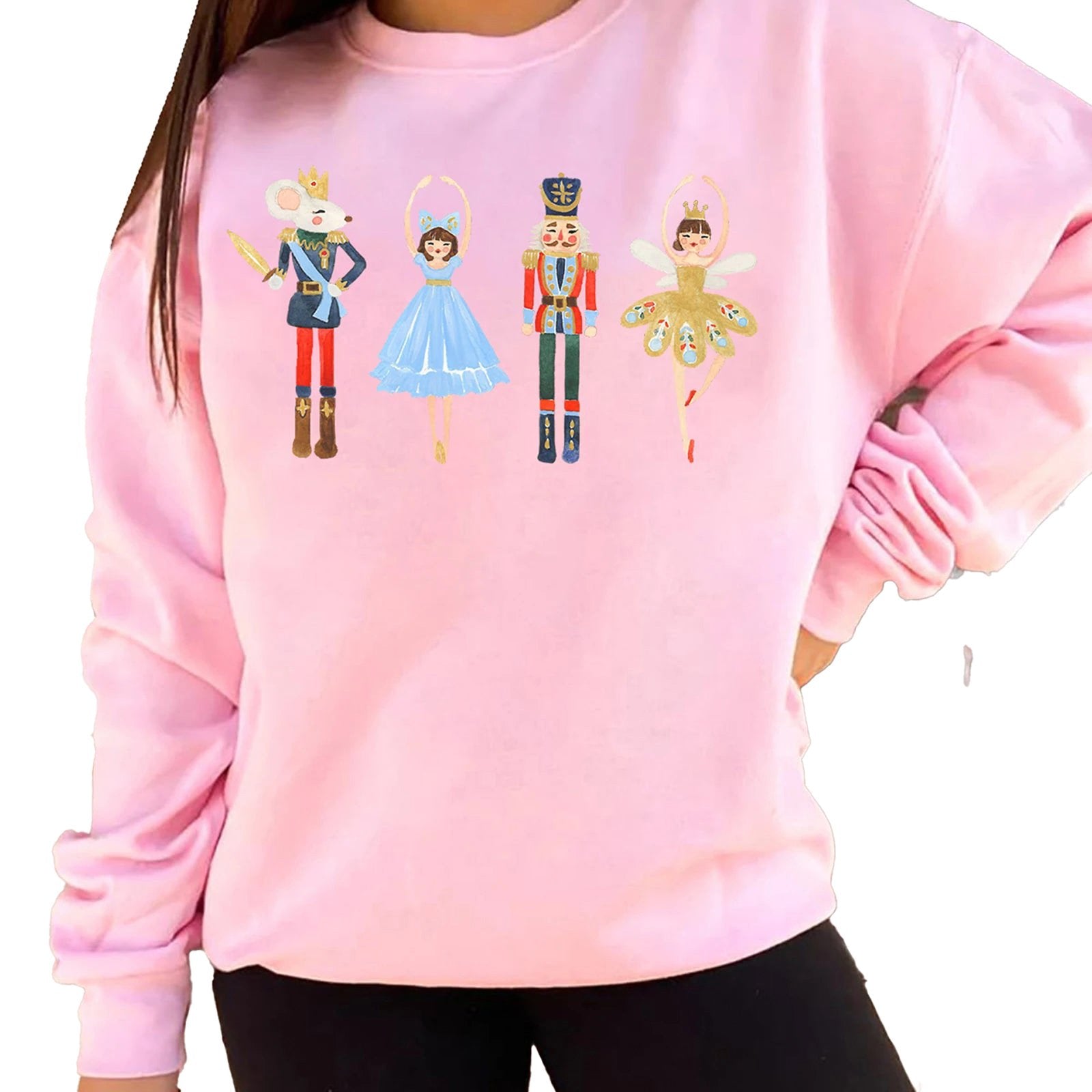 Pink women's Christmas pullover sweatshirt with festive nutcracker and ballet designs for holiday cheer