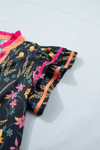 Colorful short sleeve women blouse with floral patterns and ruffled sleeves by LuckeLadybug LLC