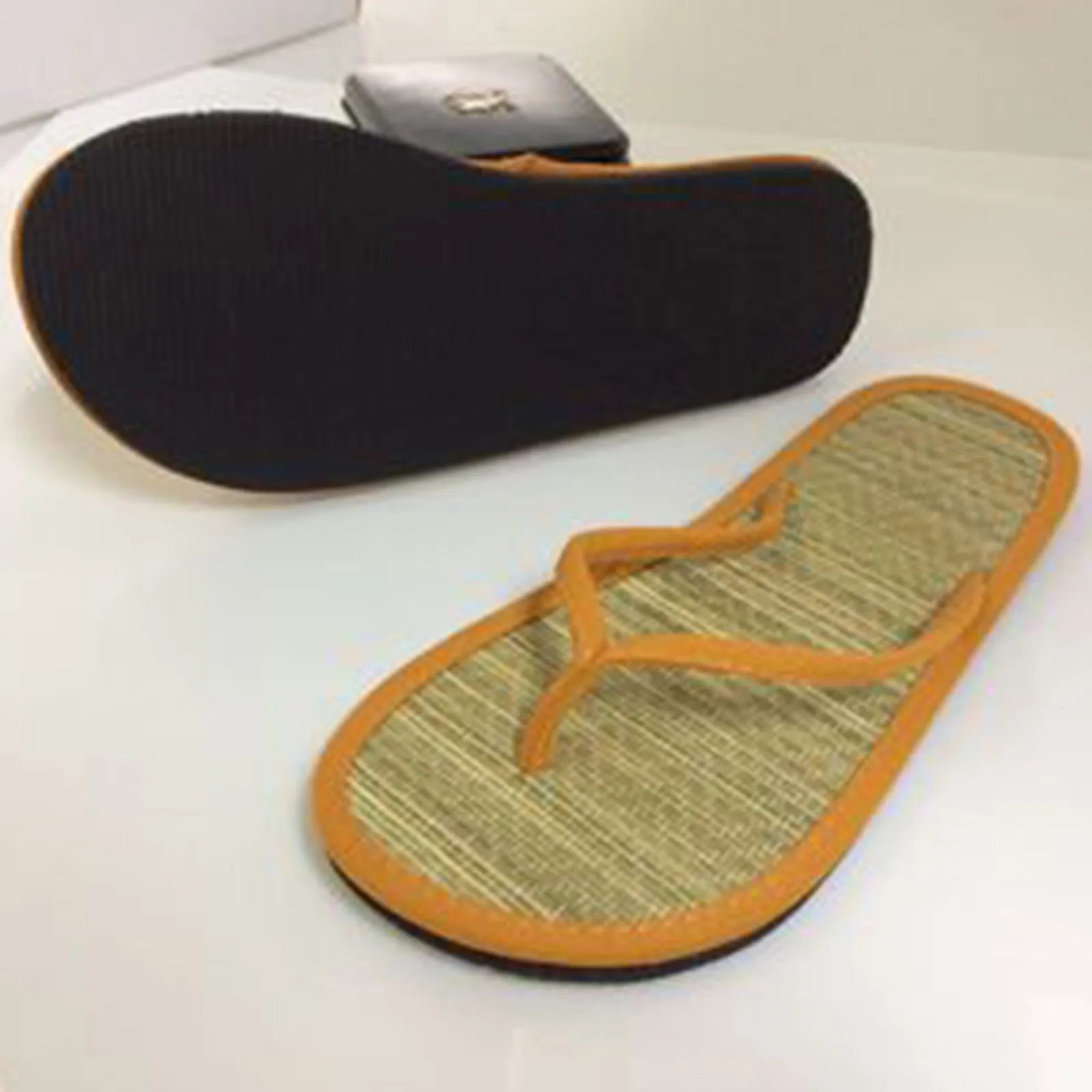 LuckeLadybug women's bamboo flip flops with comfortable textured sole and stylish orange straps