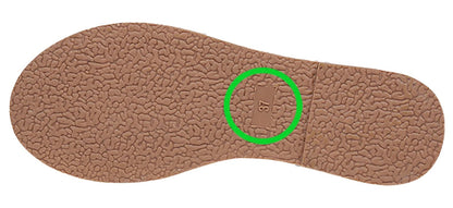 Bottom view of women's bamboo flip flops showing textured sole for grip and comfort