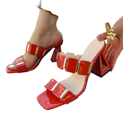 Red women's block heel sandals with stylish buckle accents and open toe design