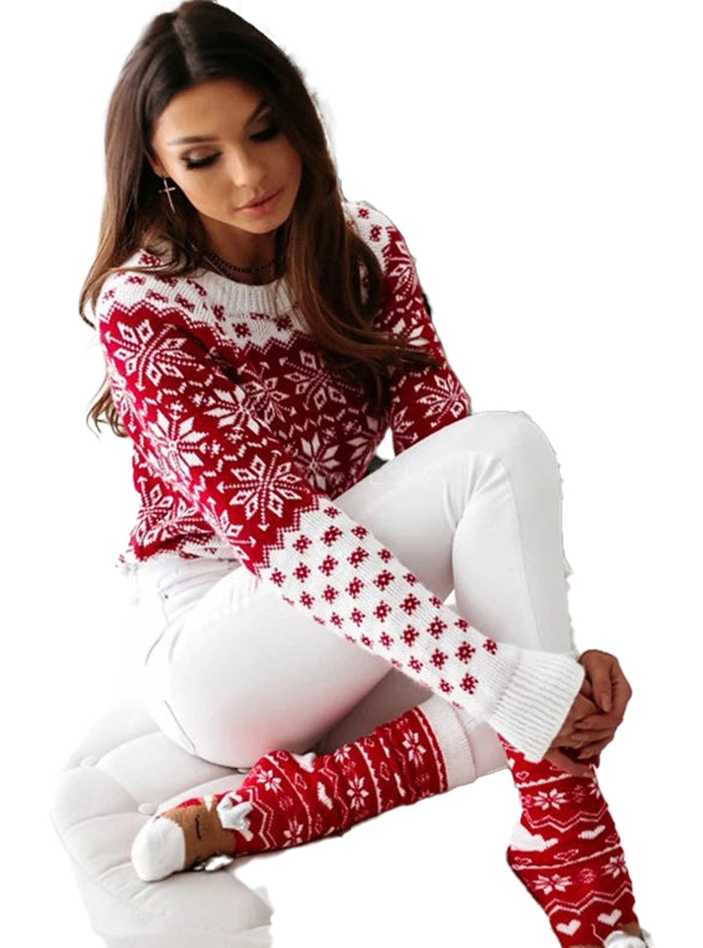 Women's Christmas snowflake sweater in red with white snowflake patterns, styled with white pants
