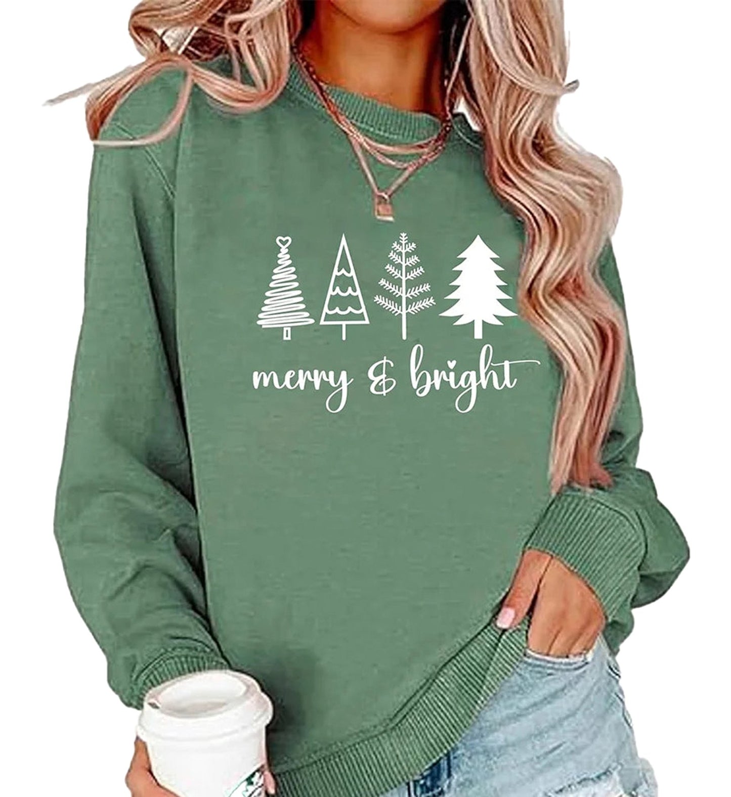 Green womens Christmas tree sweatshirt featuring festive tree designs and the phrase merry & bright