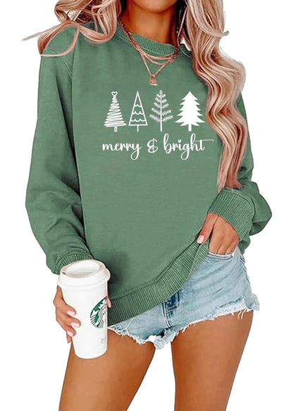 Womens Christmas tree sweatshirt in green with merry and bright design, paired with shorts and a coffee cup