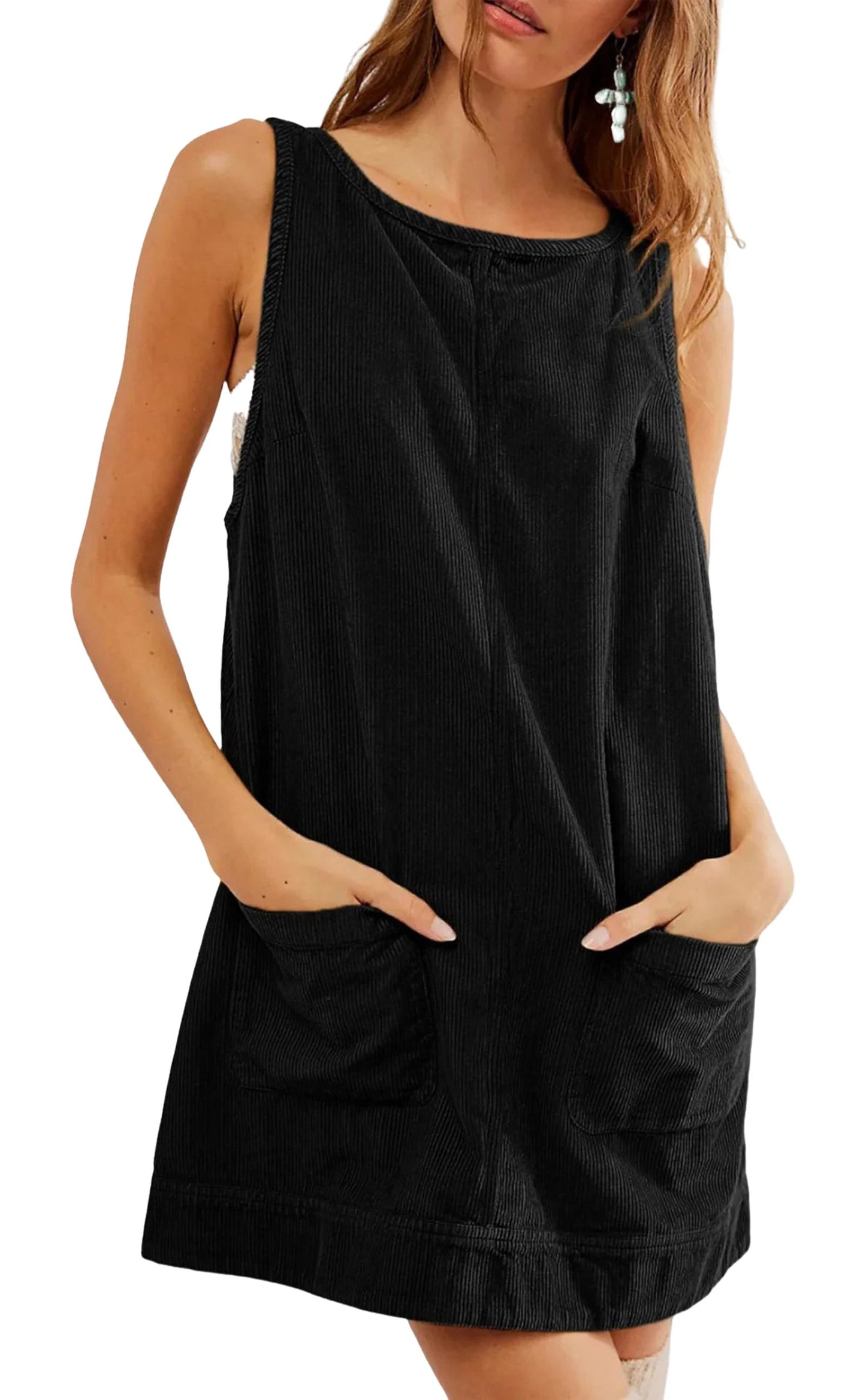 Women's corduroy pinafore dress in black with side pockets and a relaxed fit