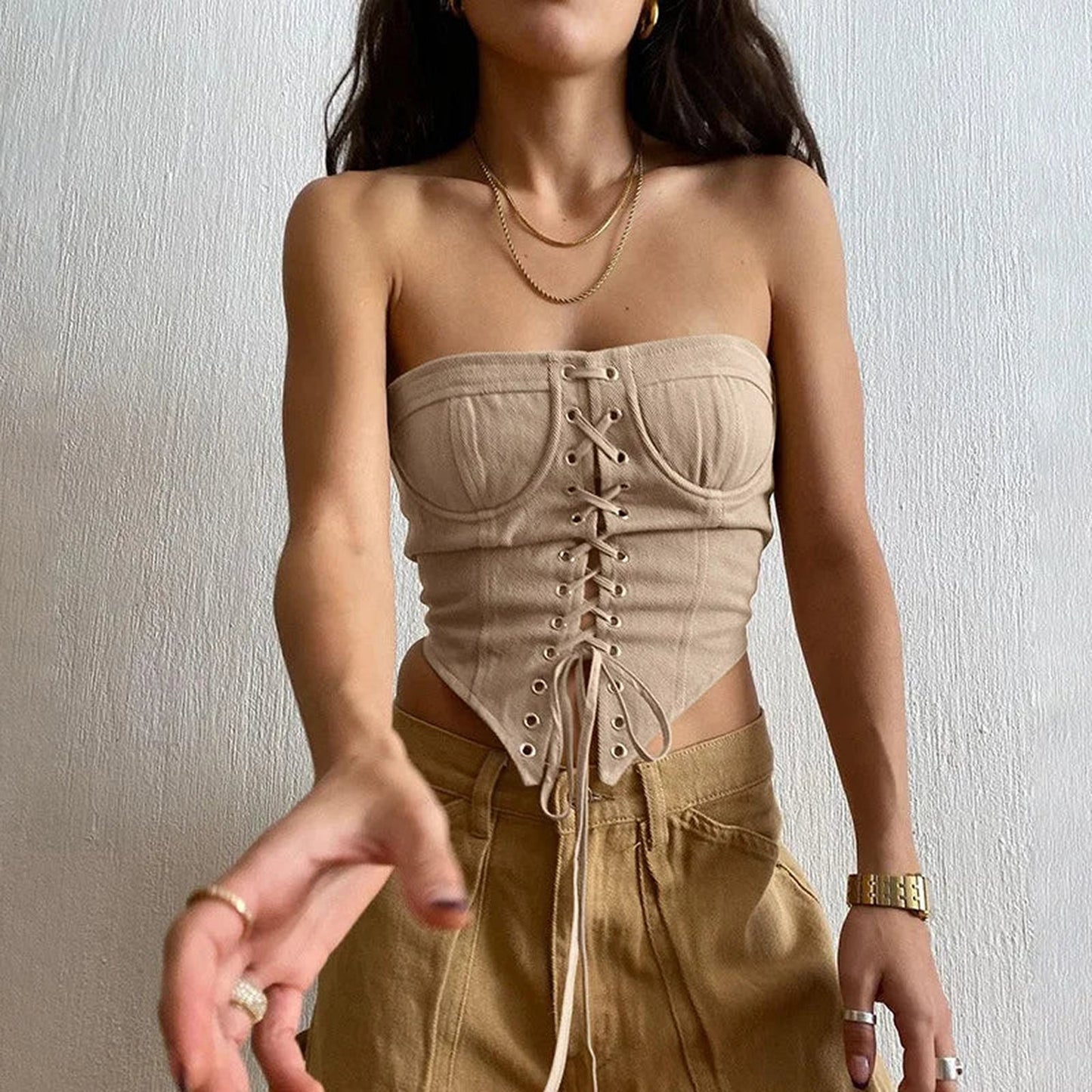 Beige women's corset crop top with lace-up front and strapless design for stylish outfits