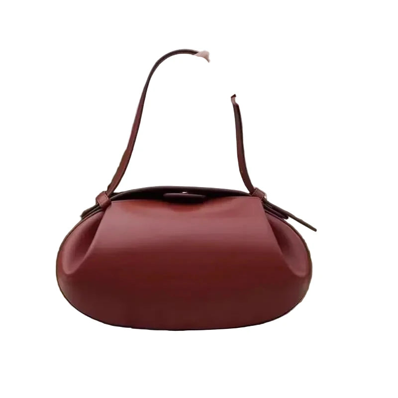 Stylish brown women's crossbody round bag with a sleek design for everyday use
