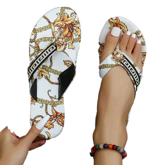 Stylish women's fashion flip flops with floral design and decorative embellishment for summer wear