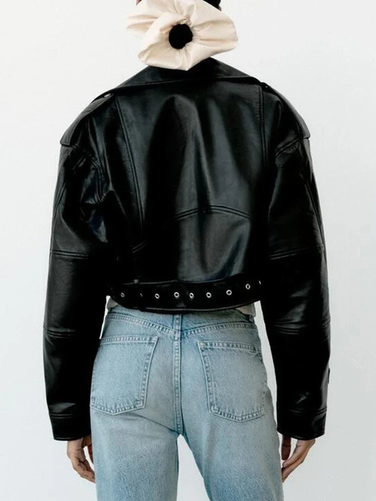Stylish women's faux leather biker jacket with cropped design, perfect for edgy fashion looks
