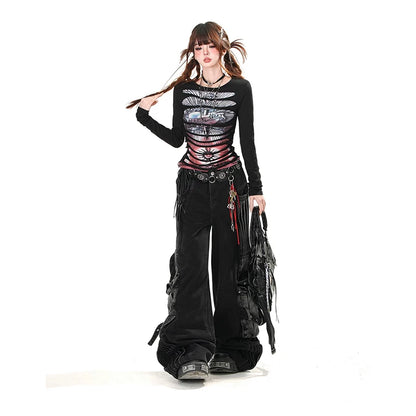 Model wearing women's gothic cargo jeans paired with a stylish black top and accessories