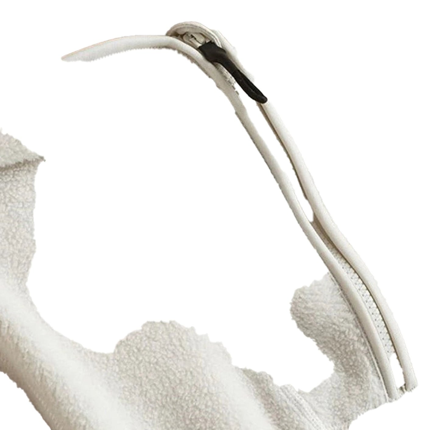 Close-up of women's hooded zip up coat showcasing the zipper and soft fabric detail