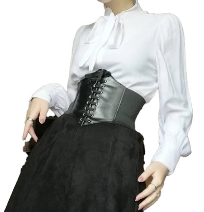 Stylish women's leather corset belt with lace-up front and flattering design for enhanced waistline
