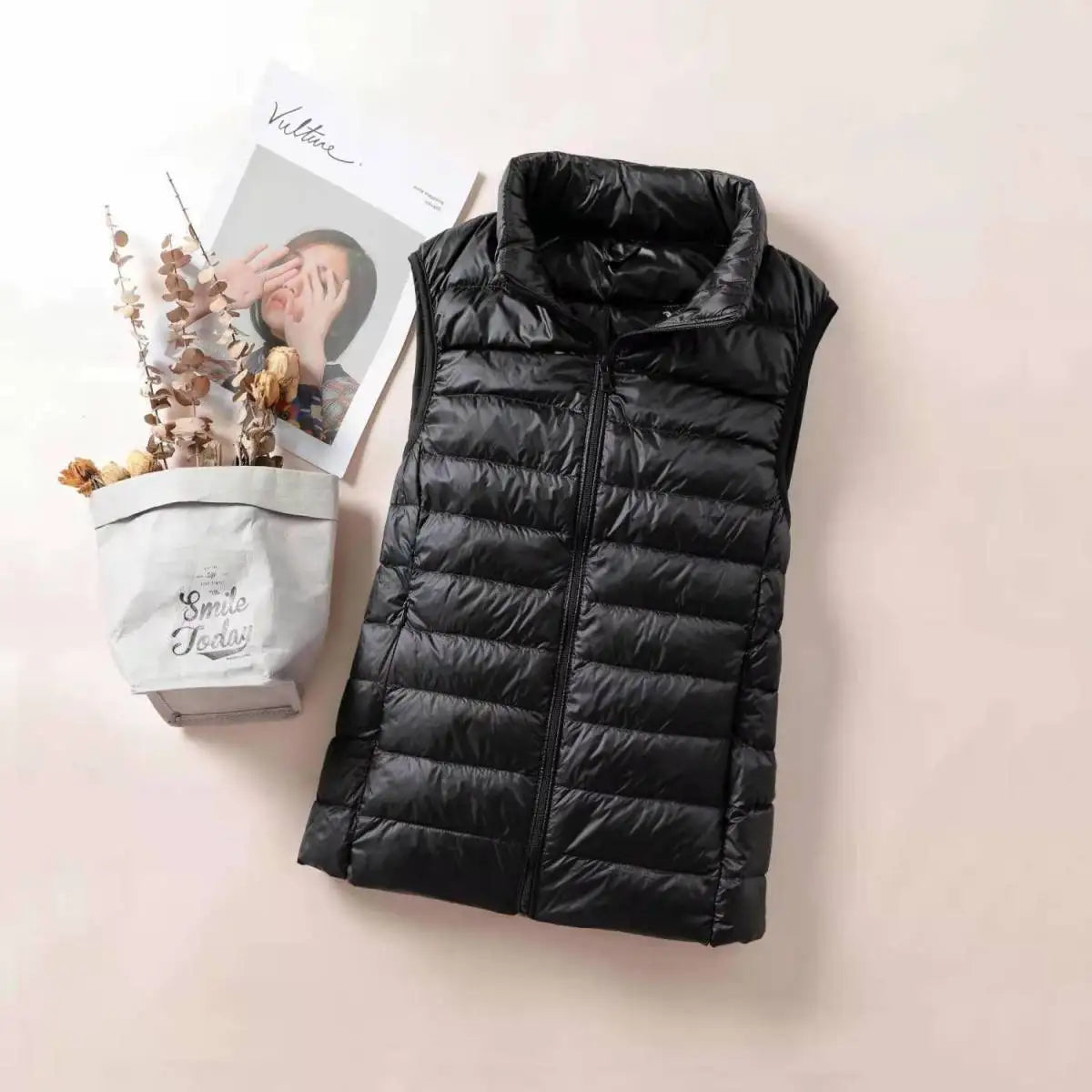 LuckeLadybug women's lightweight down vest in black with a stylish design for layering