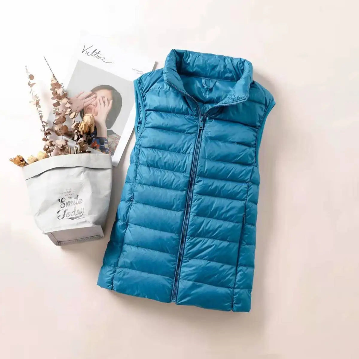 LuckeLadybug women's lightweight down vest in blue, perfect for layering and warmth