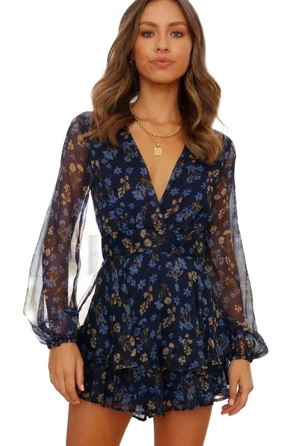 Women's long sleeve floral mini dress by LuckeLadybug LLC with tiered ruffles and a deep V neckline